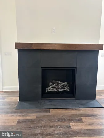 a living room with a fireplace