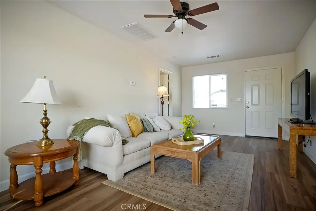 9999 North Shelton Road Linden, CA 95236 - Photo 37 of 75 a living room with furniture a window and a flat screen tv