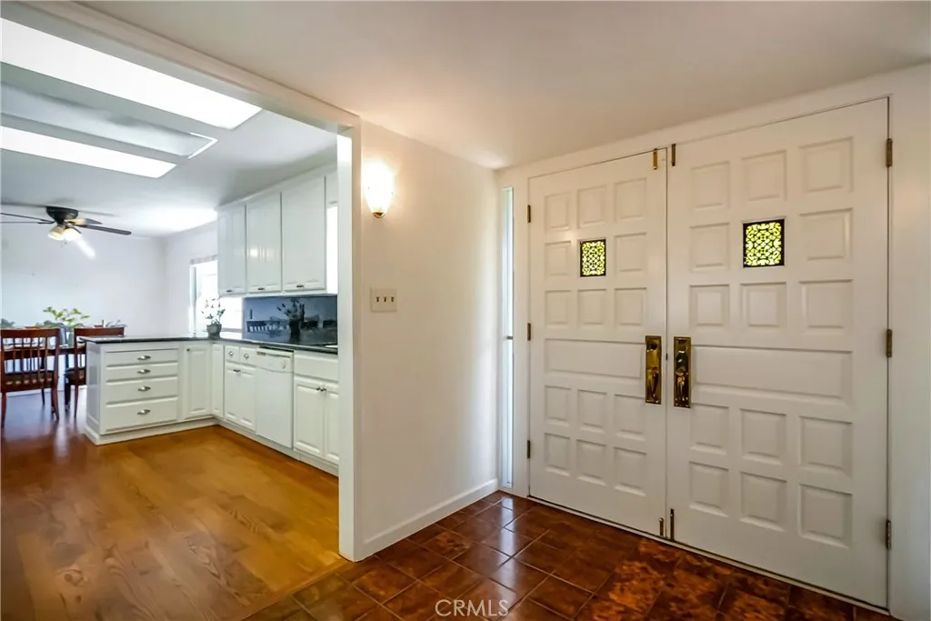 9999 North Shelton Road Linden, CA 95236 - Photo 9 of 75 a view of a kitchen with white cabinets and wooden floor