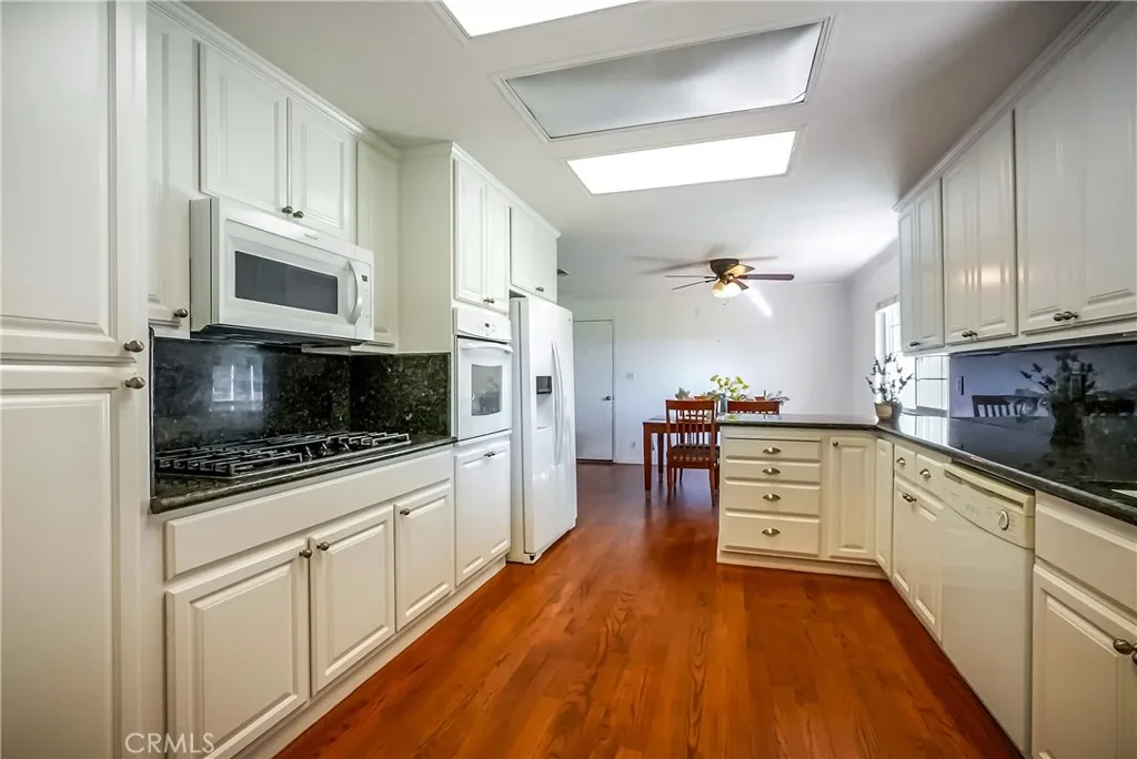 9999 North Shelton Road Linden, CA 95236 - Photo 10 of 75 a kitchen with stainless steel appliances a stove a sink and a microwave
