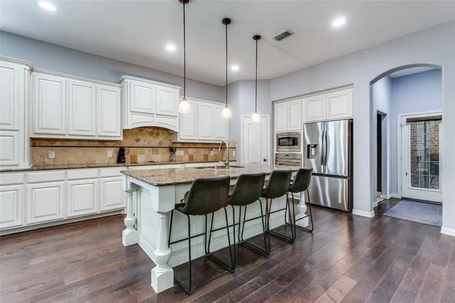 $635,000 | 7811 Glen Hollow Lane, Sachse, TX 75048