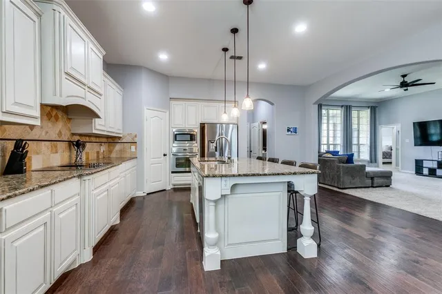 $635,000 | 7811 Glen Hollow Lane, Sachse, TX 75048