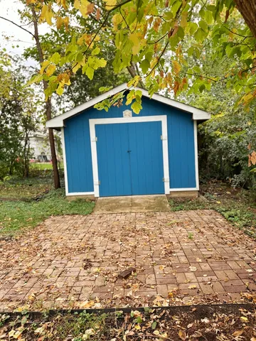 a house view with a garden space