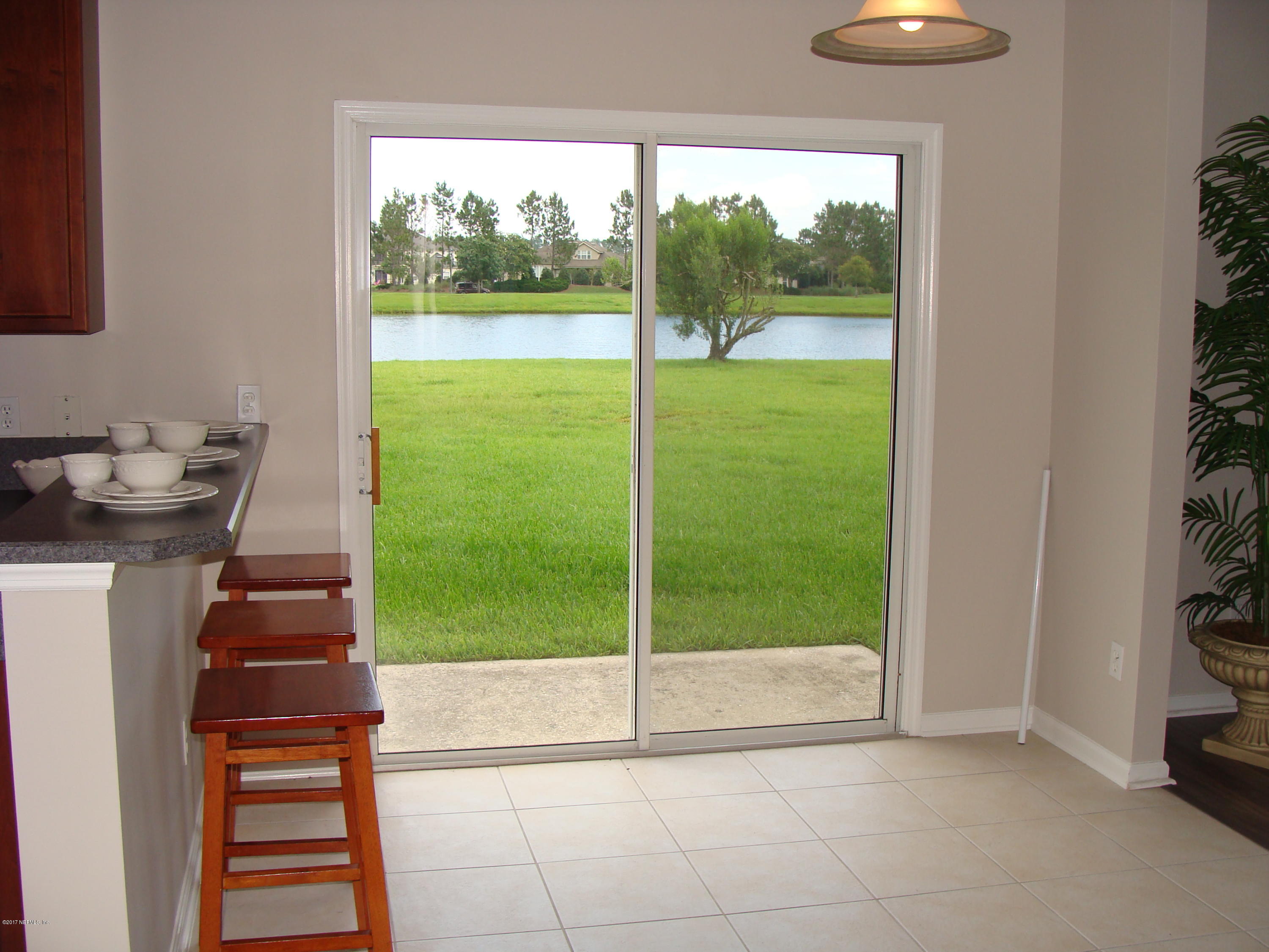1408 Riva Del Garda Way St. Augustine, FL 32092 - Photo 13 of 54 View through sliding glass doors