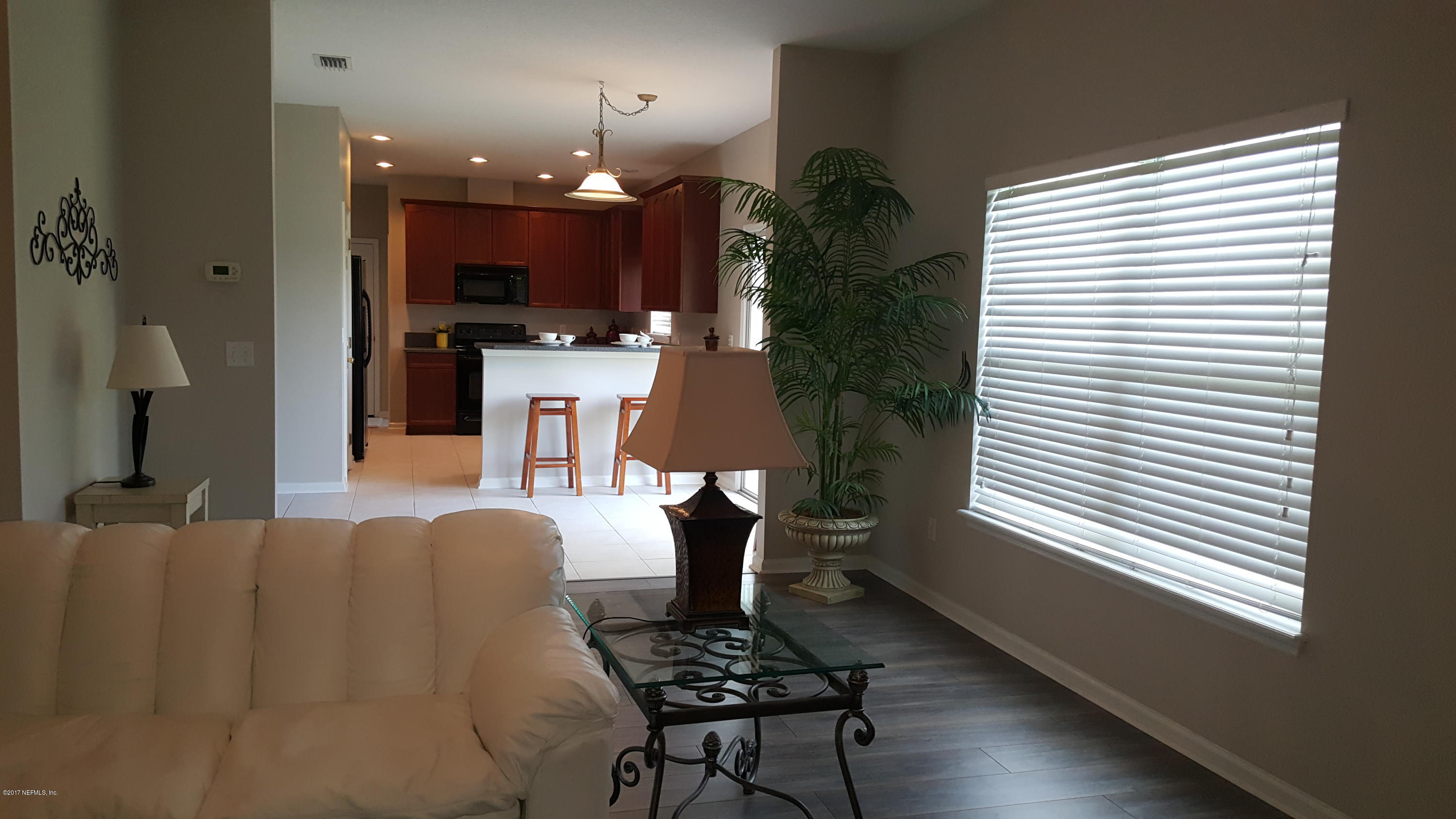 1408 Riva Del Garda Way St. Augustine, FL 32092 - Photo 49 of 54 Living Rm to Kitchen