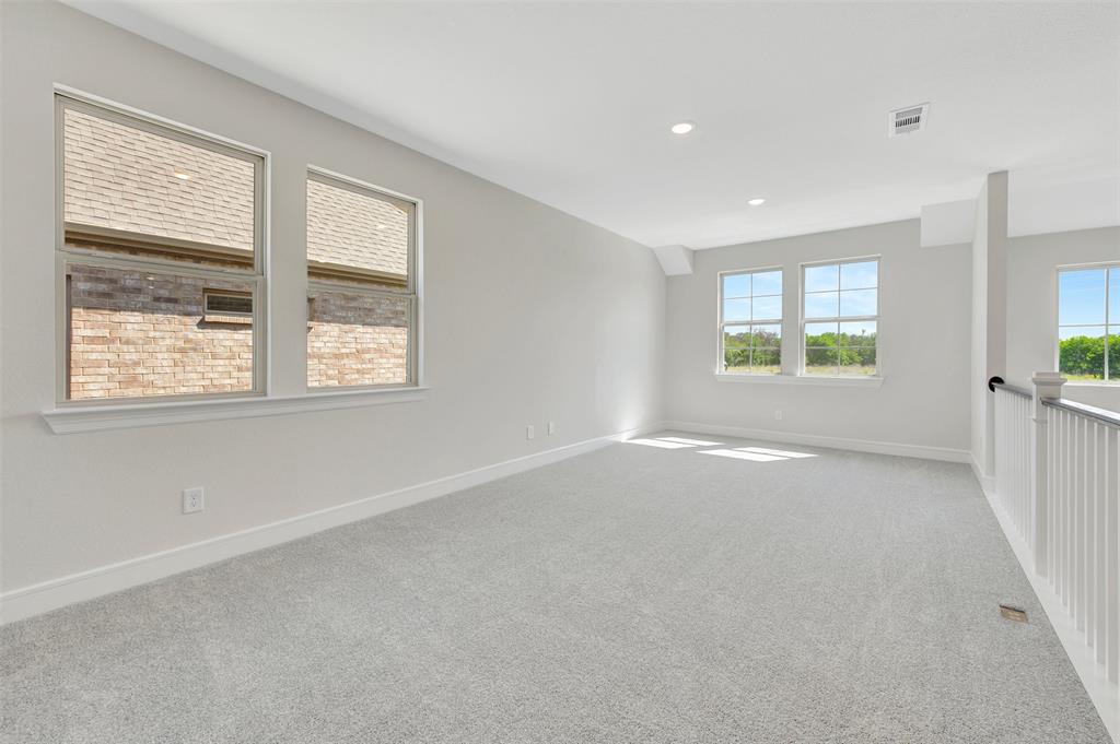 11460 Wulstone Road Fort Worth, TX 76052 - Photo 21 of 40 an empty room with windows