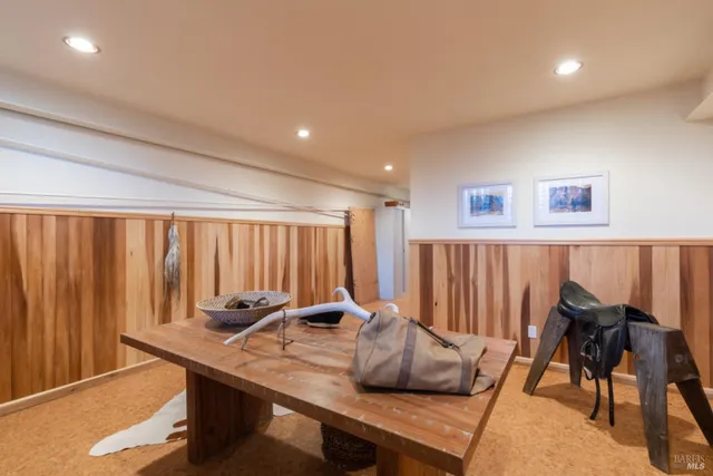 a view of a house with a yard and a garage