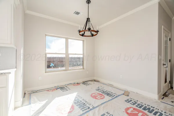 a bathroom with a window sink and window