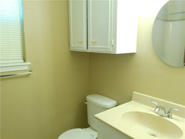 a bathroom with a sink and a toilet
