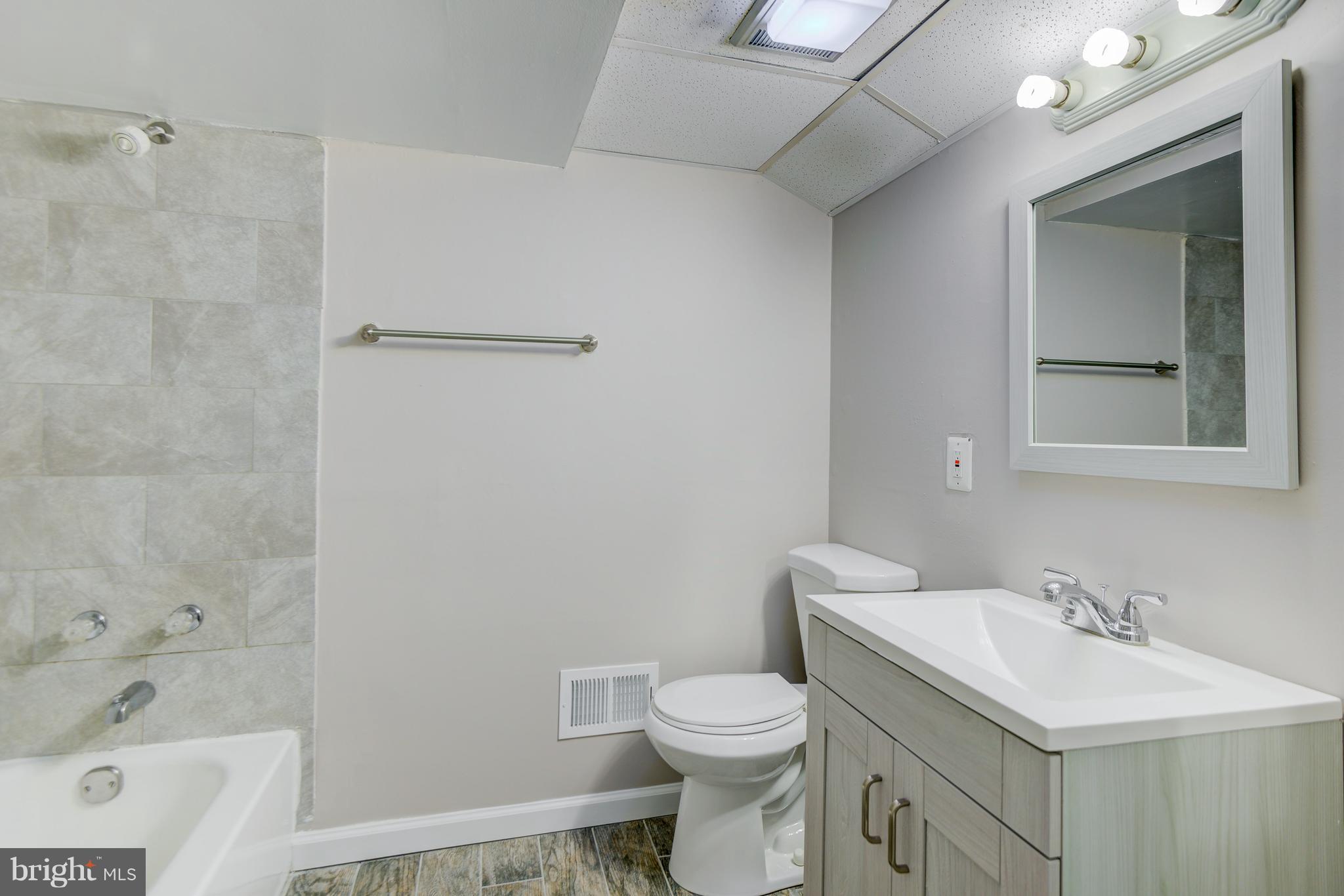 1901 Talbot Street Baltimore, MD 21207 - Photo 22 of 30 Lower Level Full Bath just off of Bed Room #4