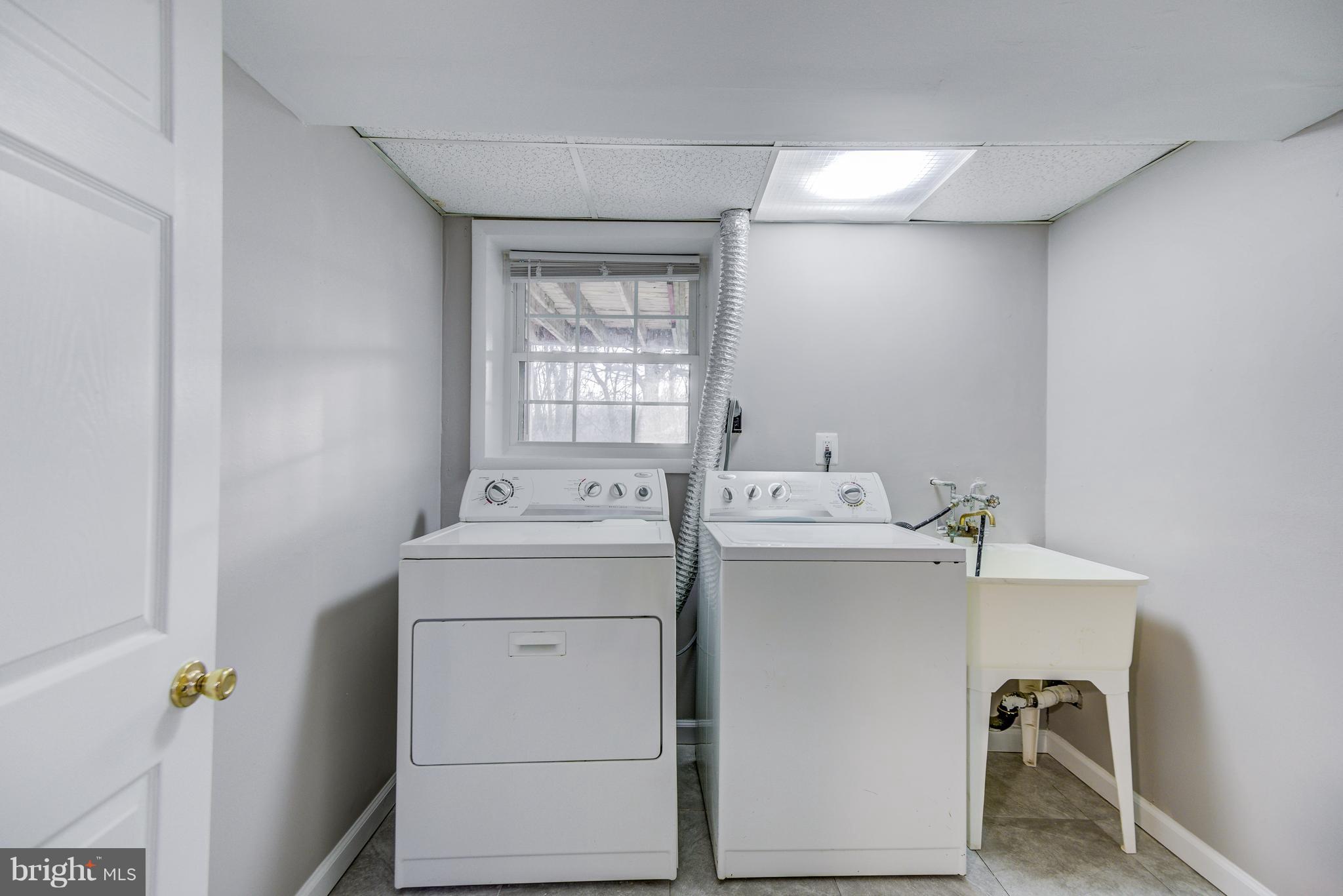 1901 Talbot Street Baltimore, MD 21207 - Photo 27 of 30 Large Utility Room with a window