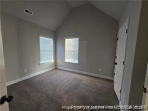 an empty room with windows