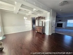 a view of an entryway with wooden floors