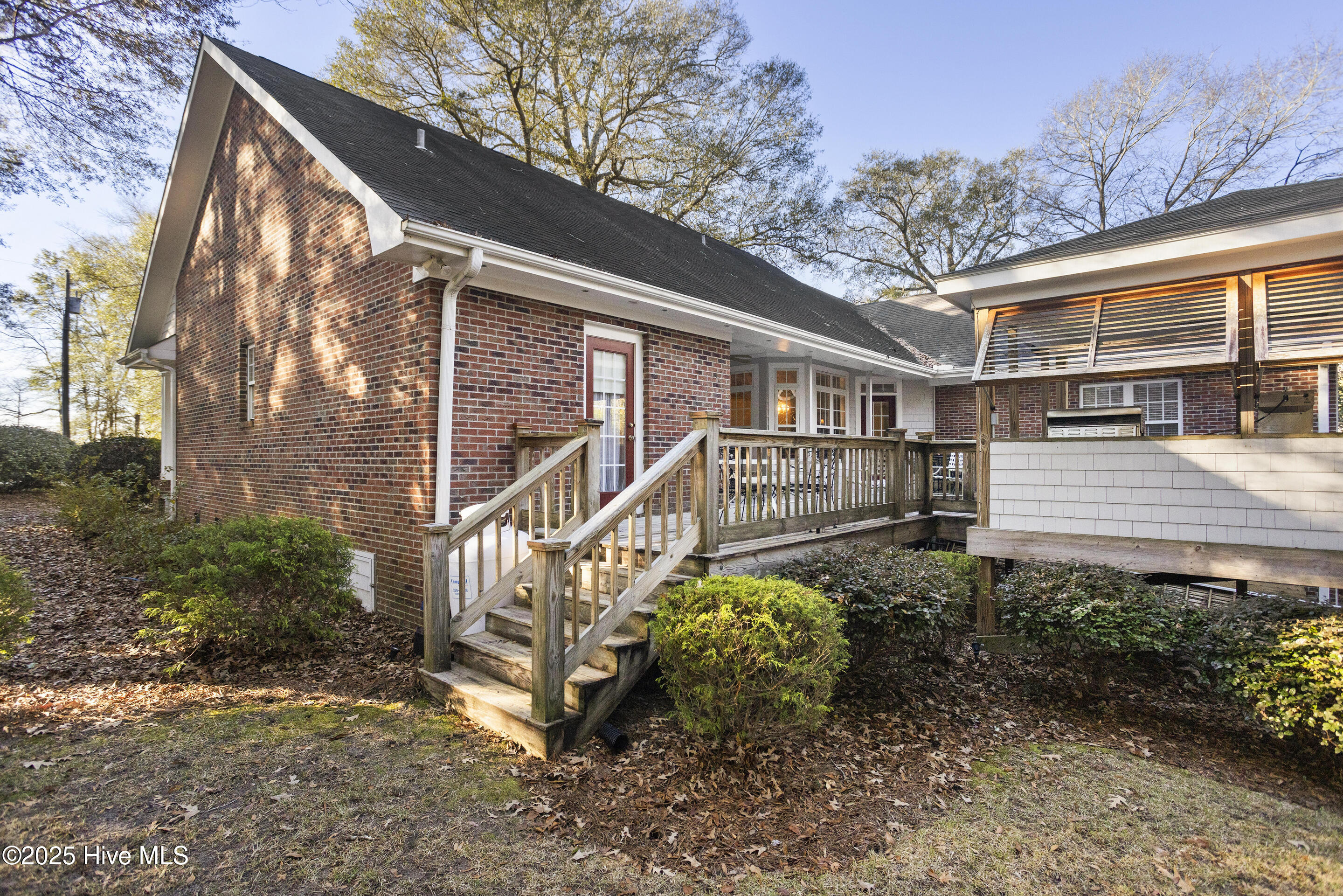 286 Goose Neck Road West Rocky Point, NC 28457 - Photo 36 of 49 Stairs leading out the large back yard
