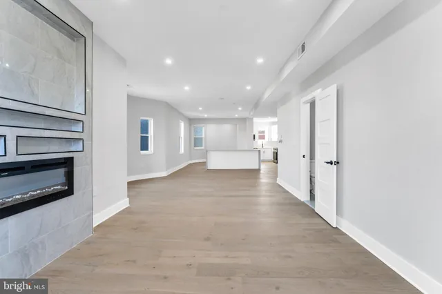 a view of a kitchen with a sink cabinets and a window