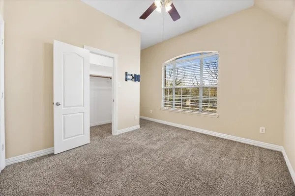 a bath tub sitting in a bathroom next to a sink