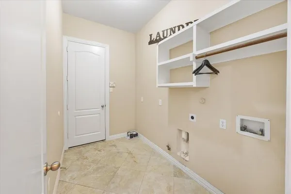 a view of a swimming pool with a yard