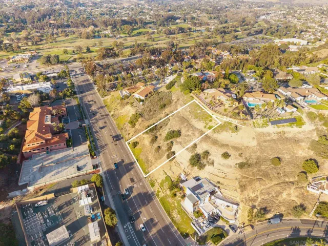 an aerial view of residential building with parking space