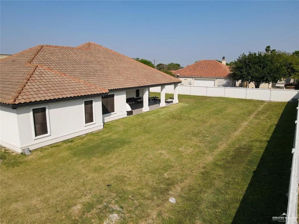 1413 Encantado Circle Palmview, TX 78572 - Photo 23 of 25 a view of a house with a swimming pool