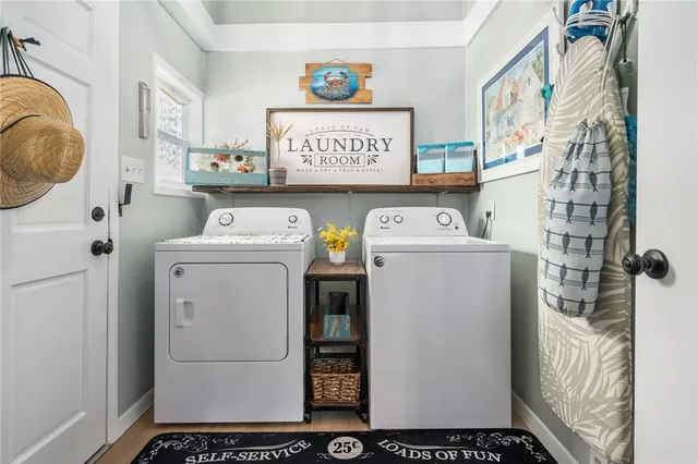 a utility room with dryer and washer