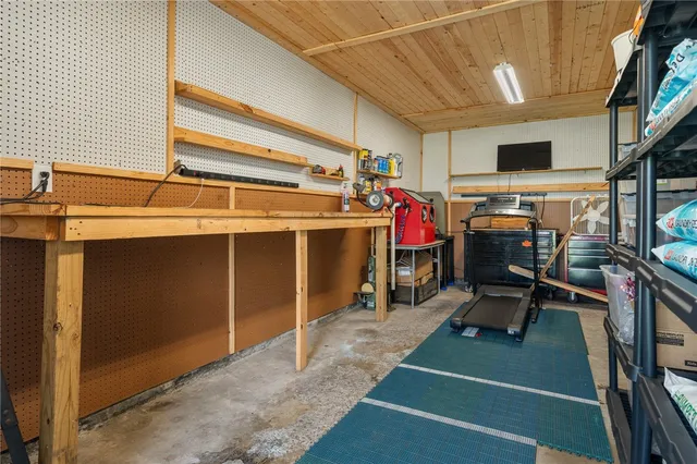 a view of a garage with chairs