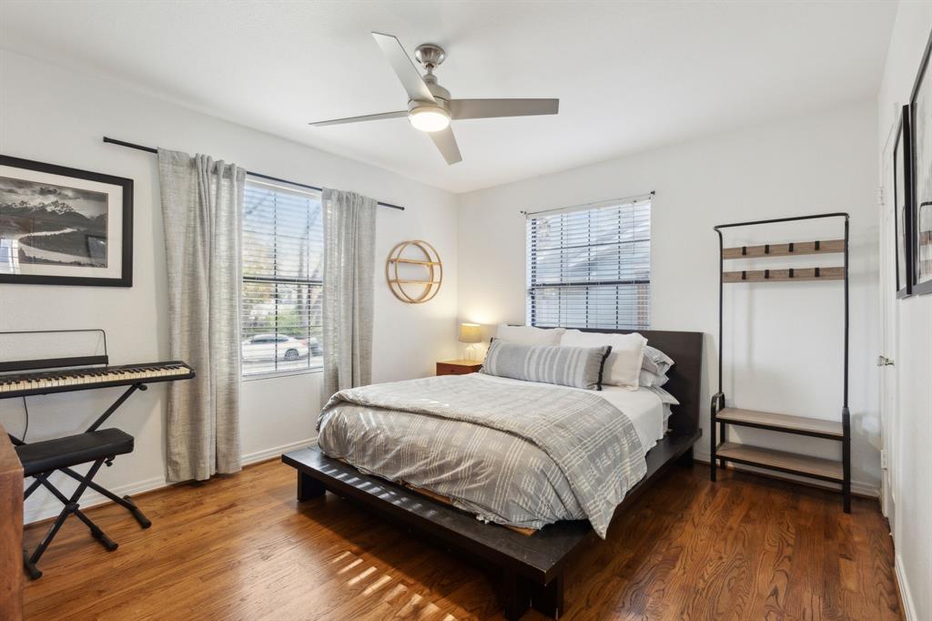 9427 Hobart Street Dallas, TX 75218 - Photo 19 of 25 a bedroom with a bed and a window