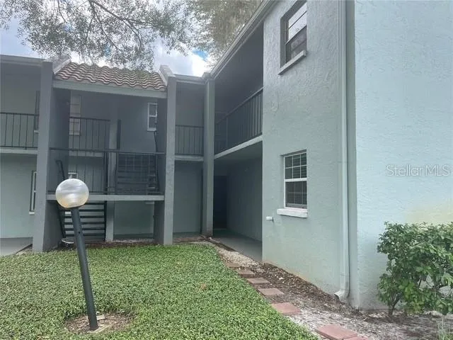 a kitchen with a sink stove and refrigerator