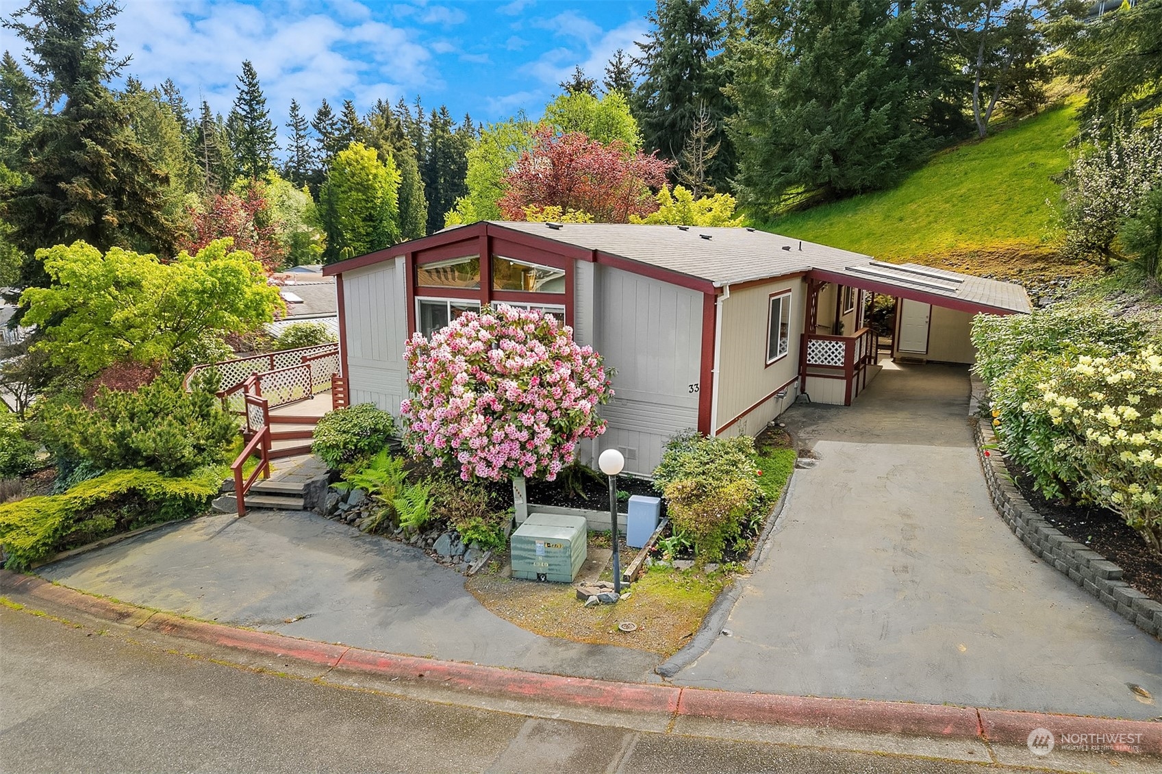 5810 Fleming Street, Unit 33 Everett, WA 98203 - Photo 2 of 28 front view of a house with a yard