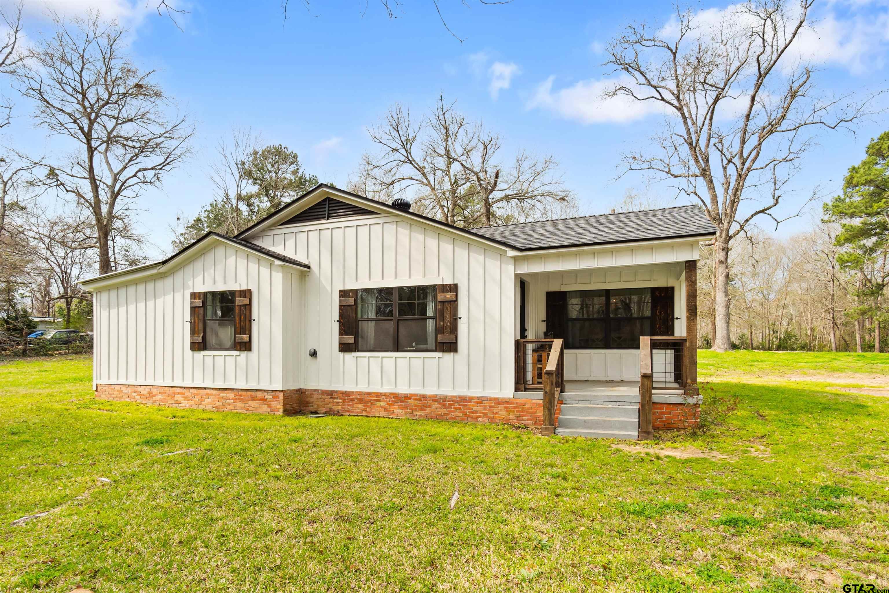 232 Farm To Market 1248 Rusk, TX 75785 - Photo 1 of 19 a front view of house with yard and green space