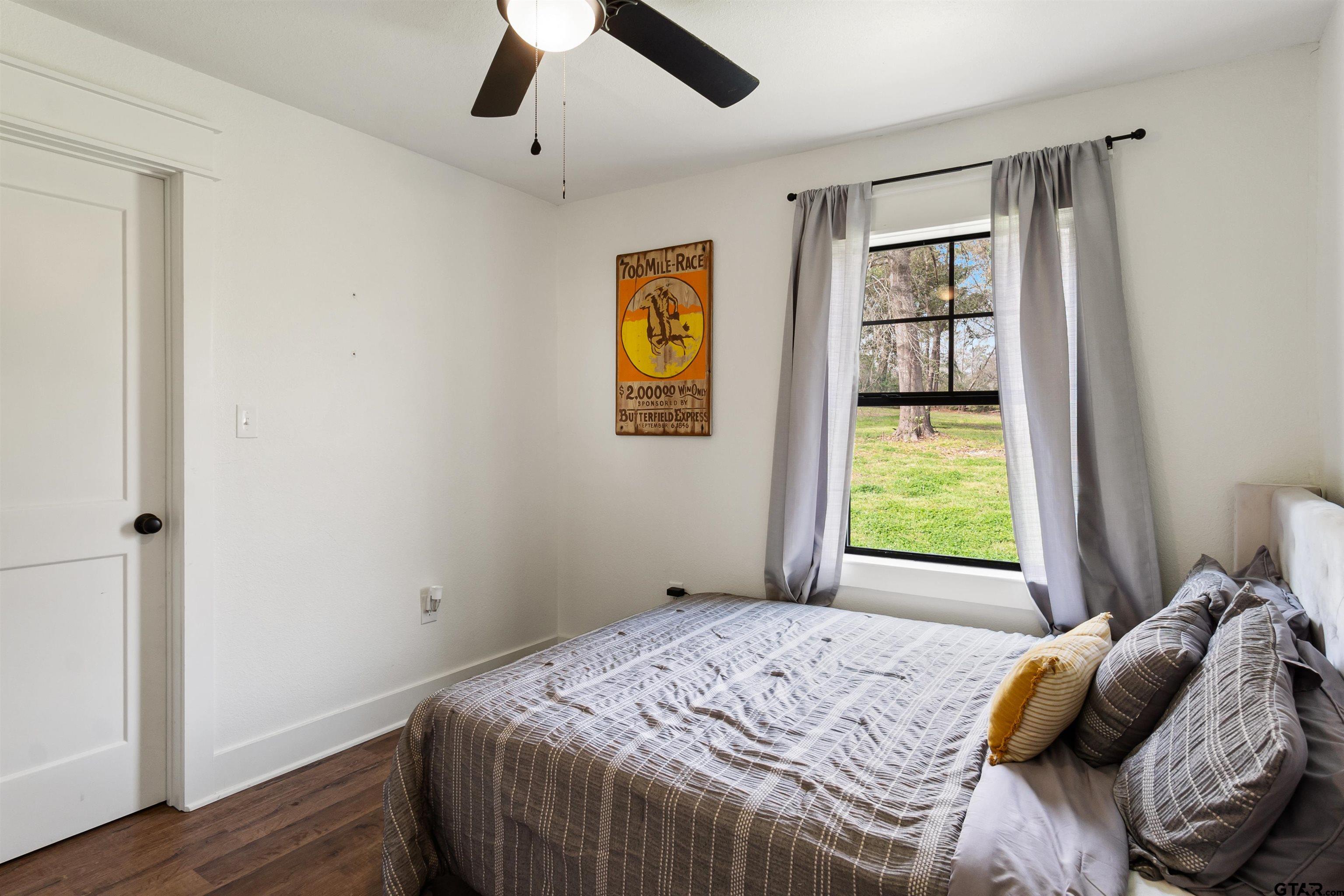 232 Farm To Market 1248 Rusk, TX 75785 - Photo 13 of 19 a bedroom with a bed and a window