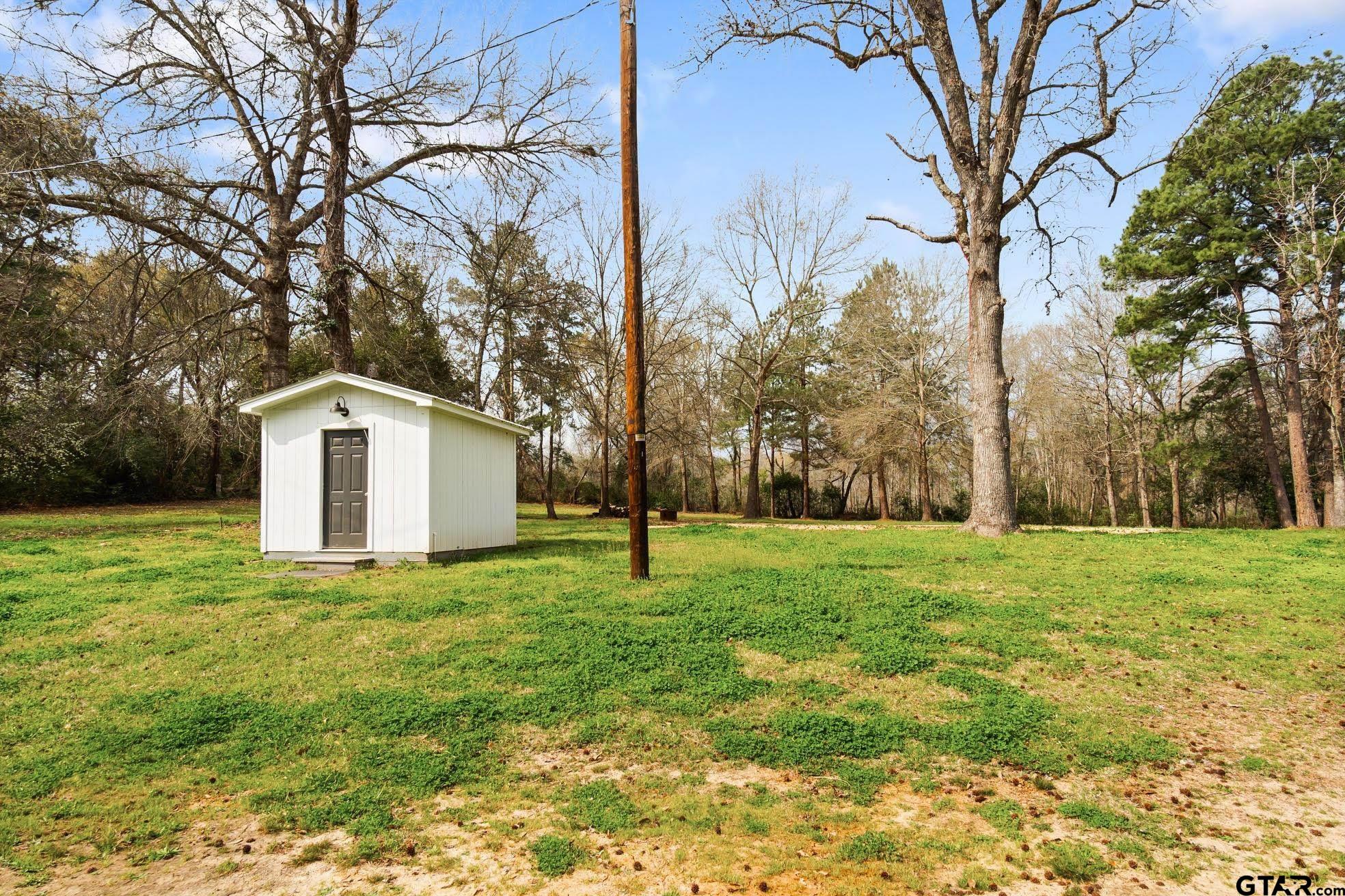 232 Farm To Market 1248 Rusk, TX 75785 - Photo 19 of 19 a house that is sitting in the forest