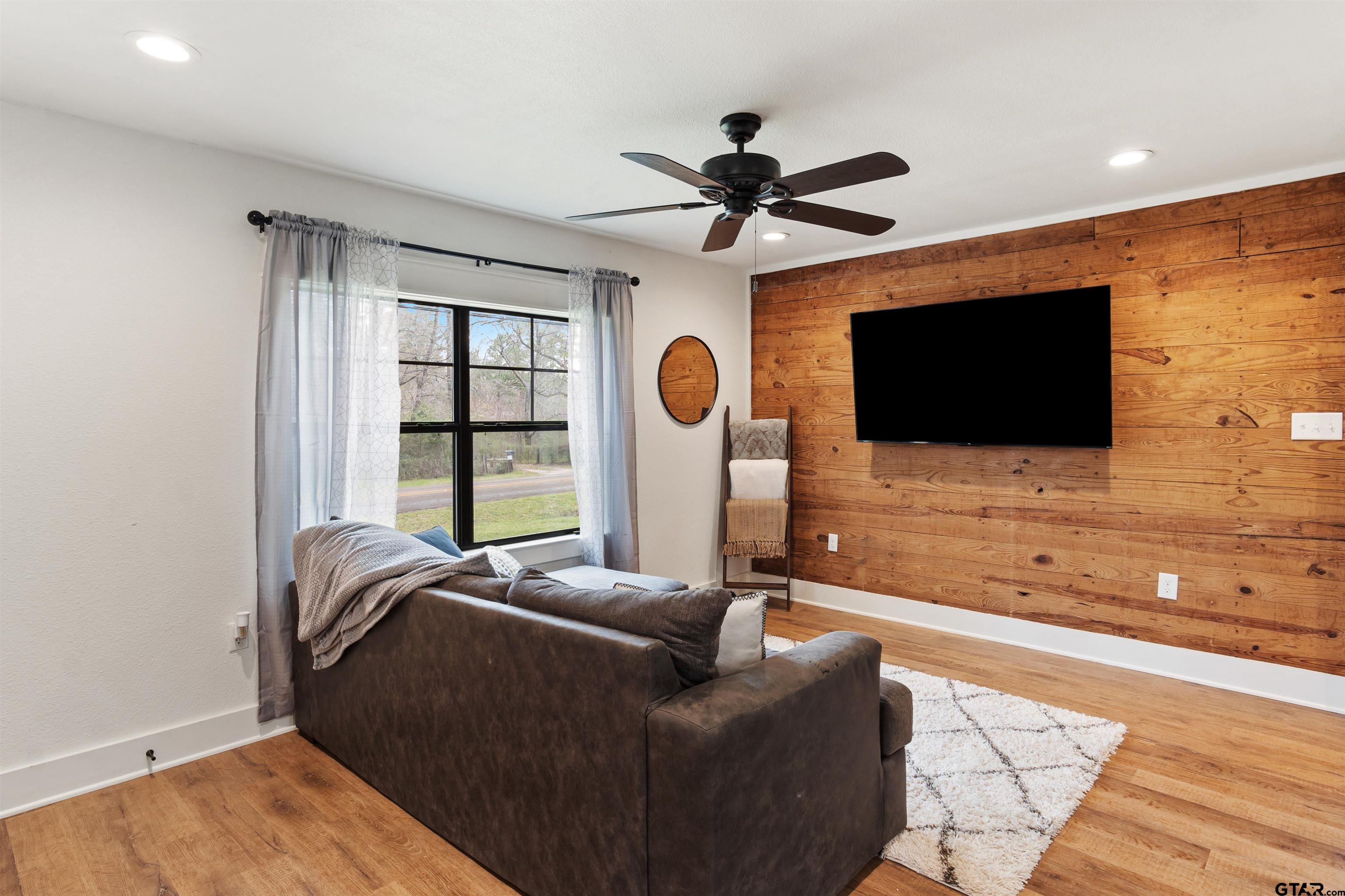 232 Farm To Market 1248 Rusk, TX 75785 - Photo 4 of 19 a living room with furniture and a flat screen tv