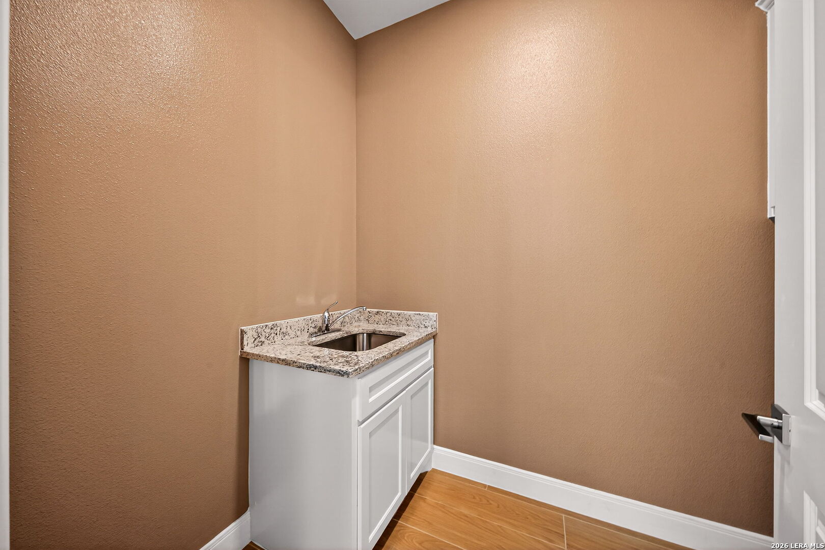 123 John T Court Castroville, TX 78009 - Photo 27 of 45 a utility room with dryer and washer