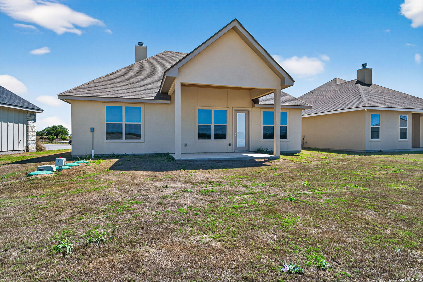 123 John T Court Castroville, TX 78009 - Photo 33 of 45 a front view of a house with a yard