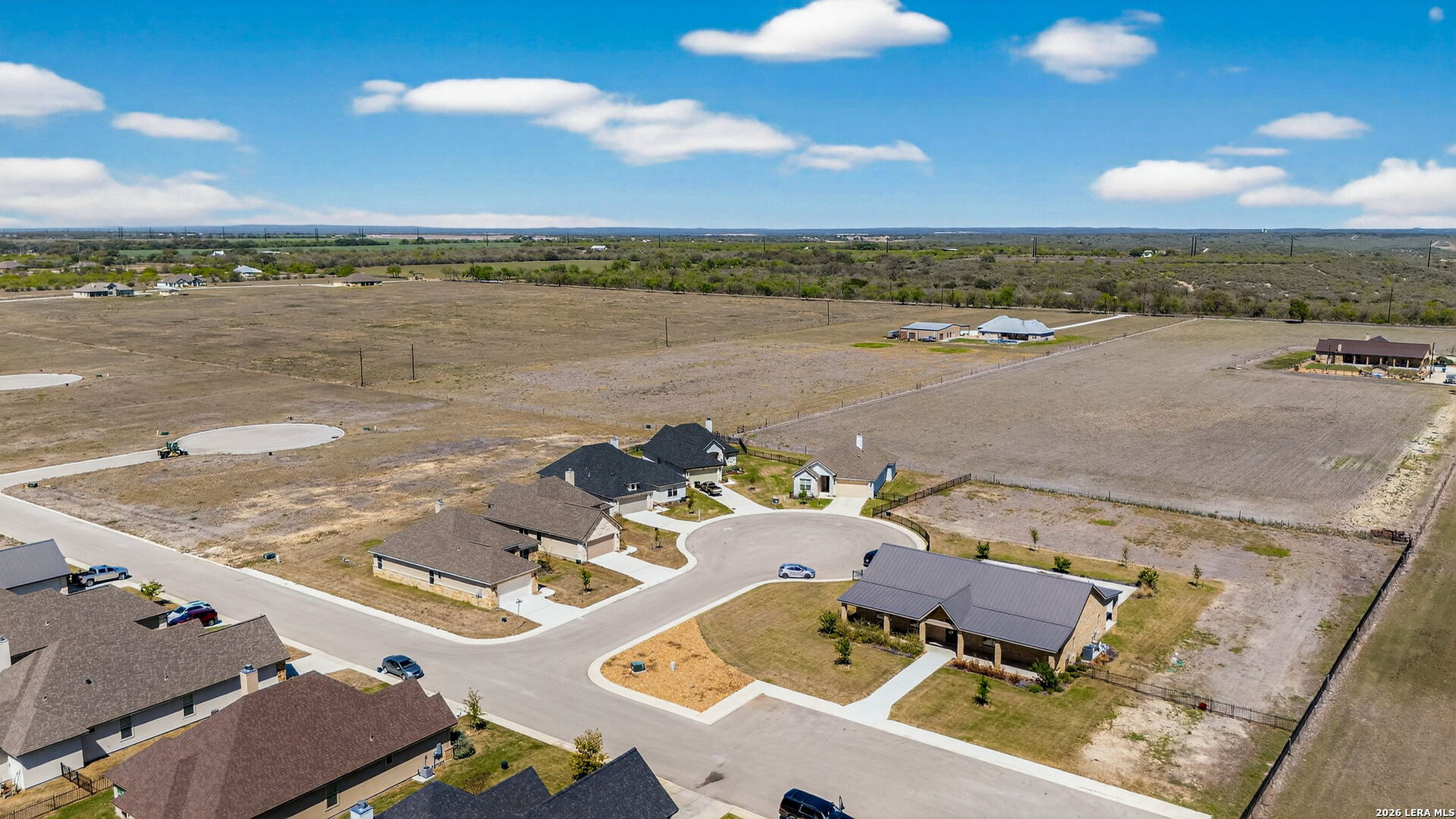 123 John T Court Castroville, TX 78009 - Photo 34 of 45 an aerial view of a house with lake view