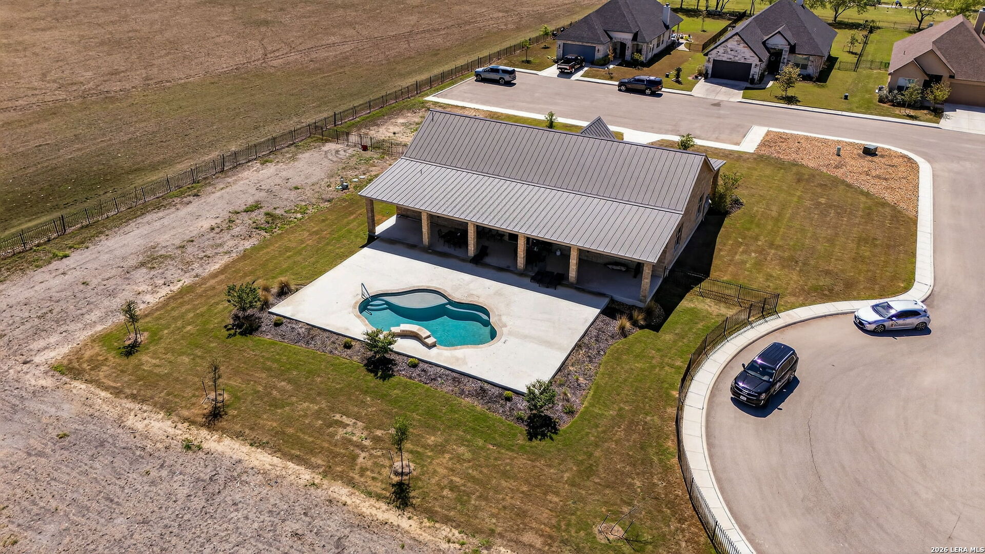 123 John T Court Castroville, TX 78009 - Photo 36 of 45 an aerial view of a swimming pool