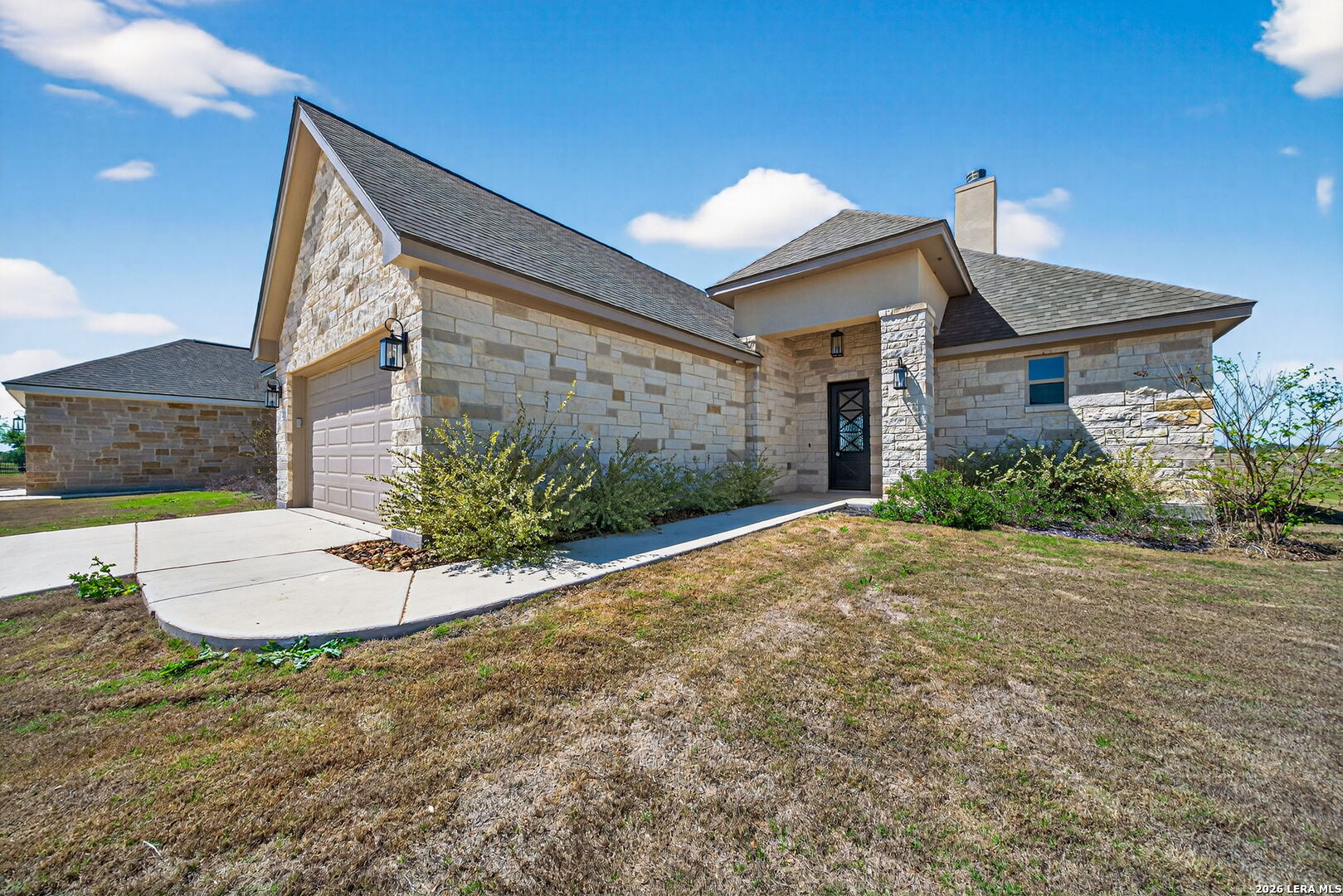 123 John T Court Castroville, TX 78009 - Photo 4 of 45 a view of a house with a yard