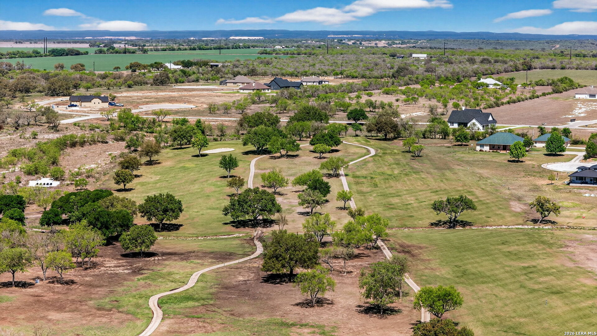 123 John T Court Castroville, TX 78009 - Photo 44 of 45 an aerial view of residential houses with outdoor space