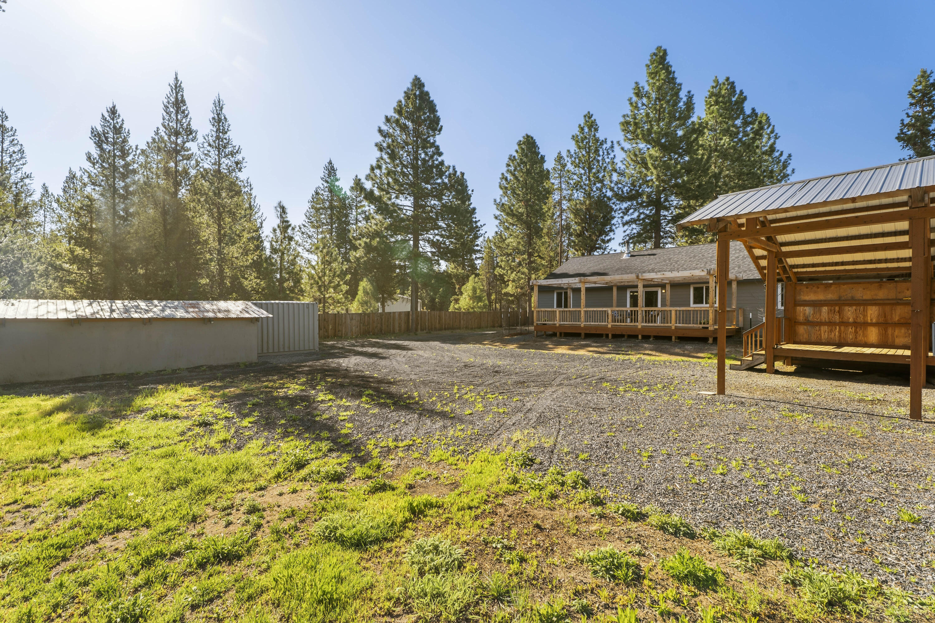 16050 Dick Road La Pine, OR 97739 - Photo 46 of 59 a view of house with backyard and trees in the background