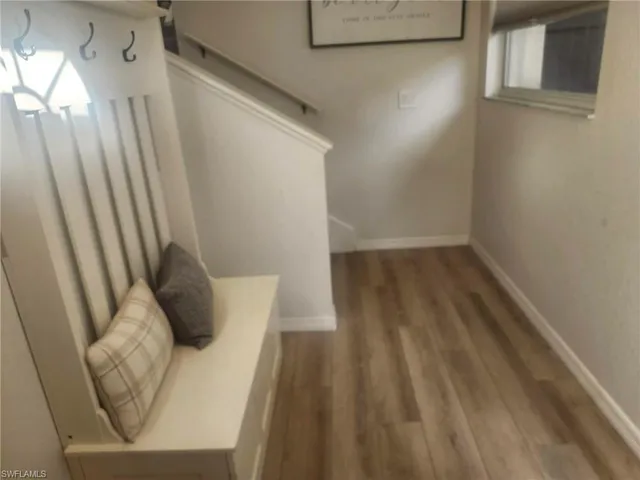 a view of balcony with furniture