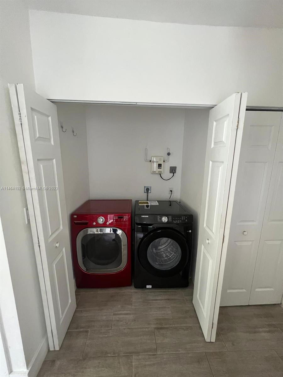 Santa Clara Miami, FL 33127 - Photo 7 of 14 a view of a storage & utility room with two washing machine