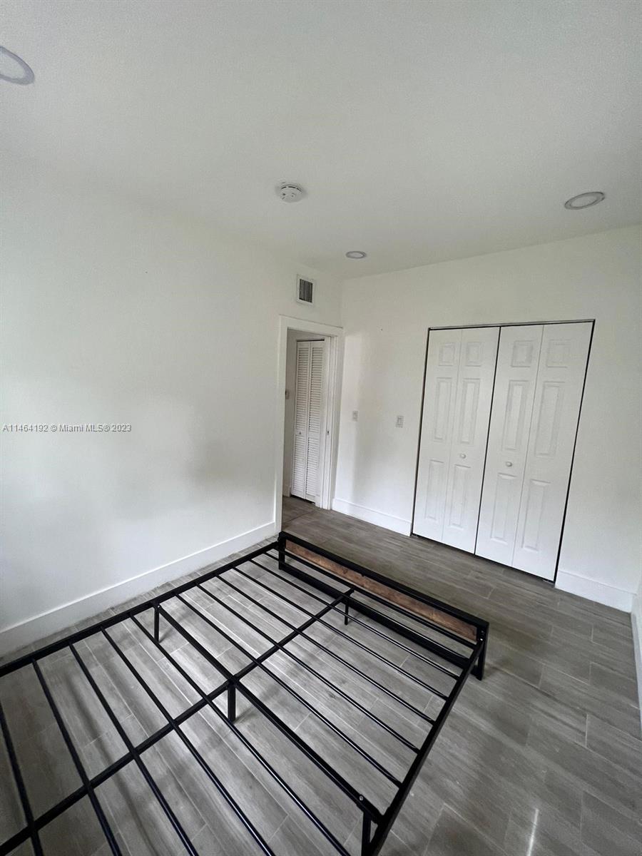 Santa Clara Miami, FL 33127 - Photo 10 of 14 a view of a room with wooden floor