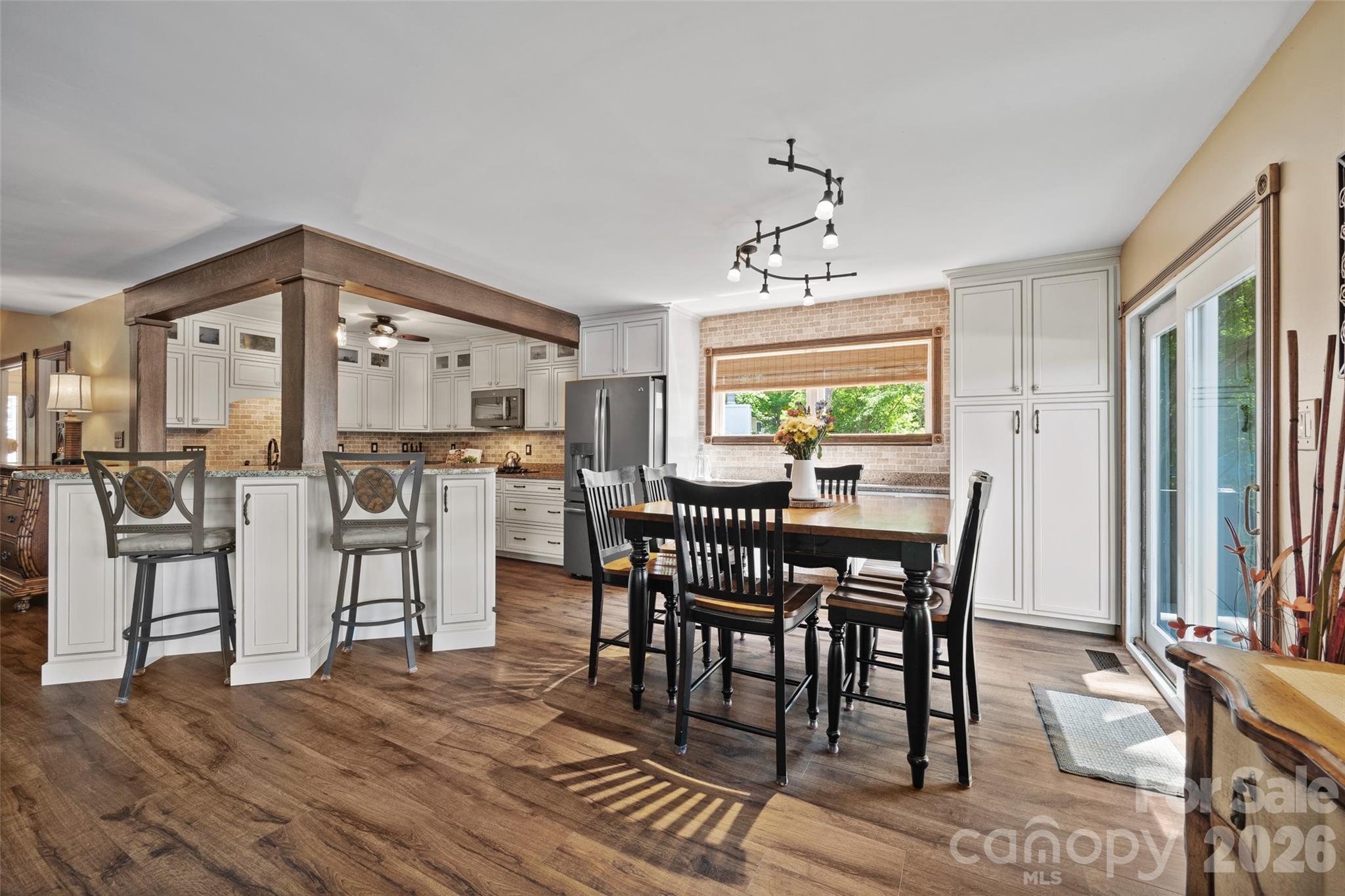 27056 Catamaran Drive Tega Cay, SC 29708 - Photo 11 of 48 a view of a dining room with furniture and window