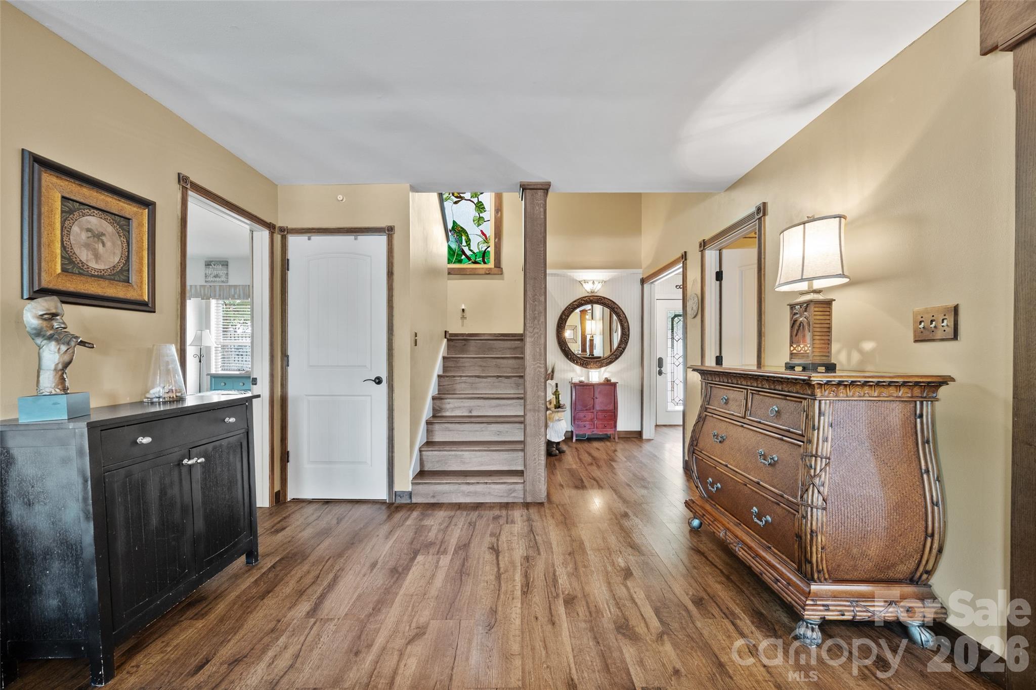 27056 Catamaran Drive Tega Cay, SC 29708 - Photo 19 of 48 a view of a hallway with wooden floor