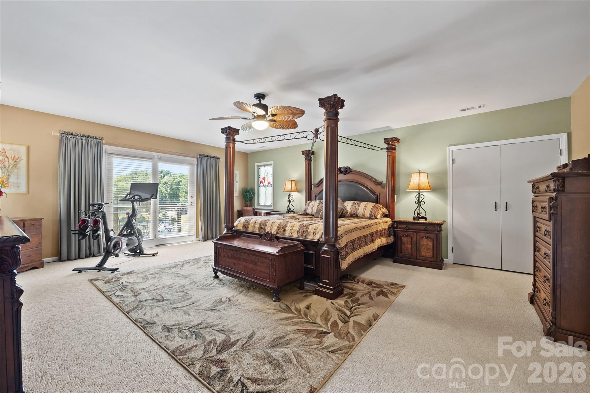 27056 Catamaran Drive Tega Cay, SC 29708 - Photo 20 of 48 a bedroom with a bed and large window