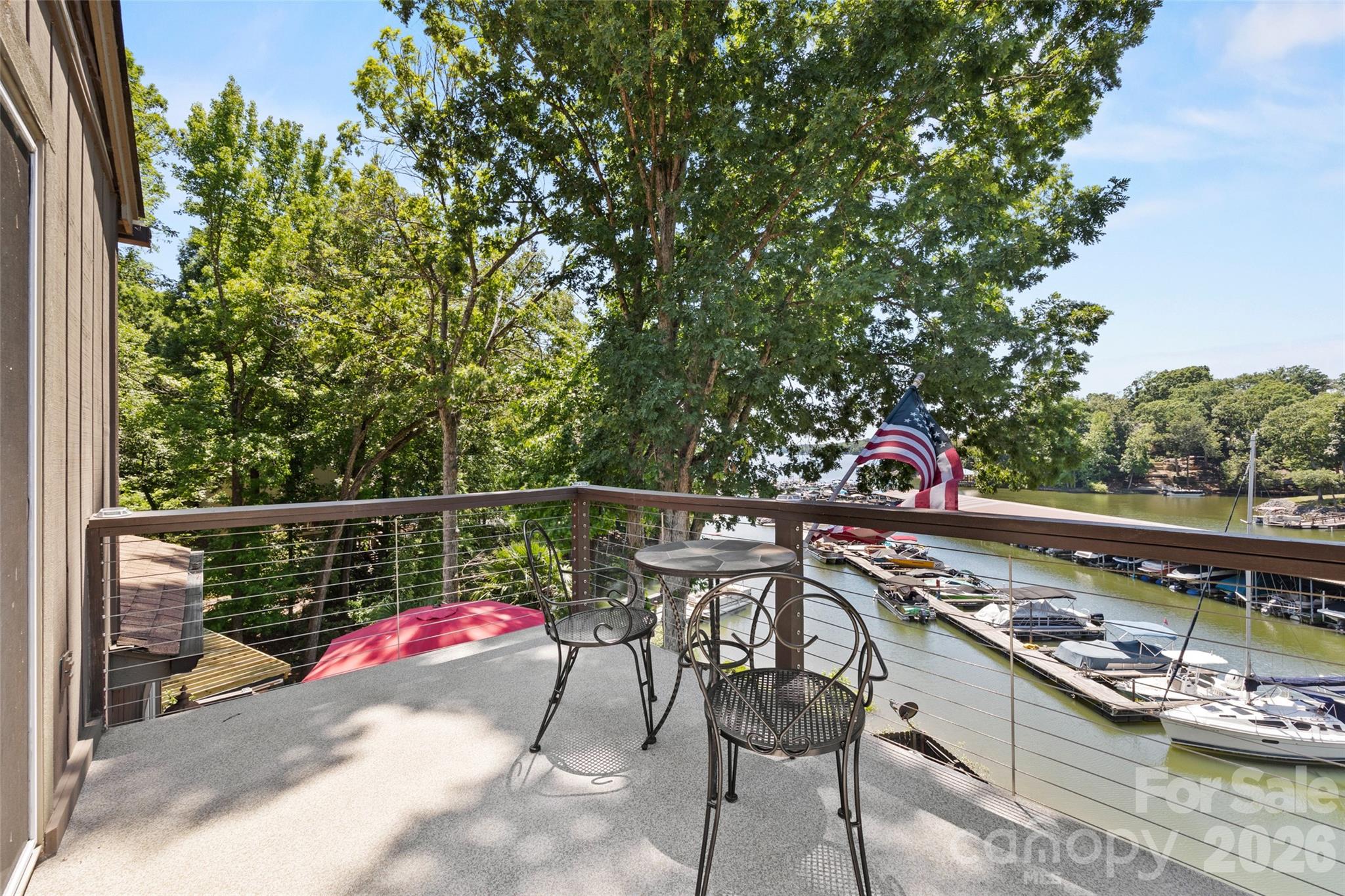 27056 Catamaran Drive Tega Cay, SC 29708 - Photo 26 of 48 a view of a swimming pool with a patio and a yard