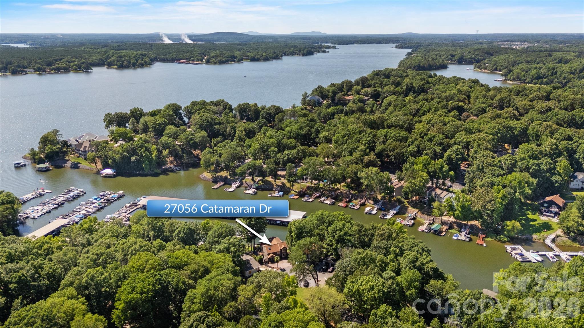 27056 Catamaran Drive Tega Cay, SC 29708 - Photo 3 of 48 a view of a lake with a lake