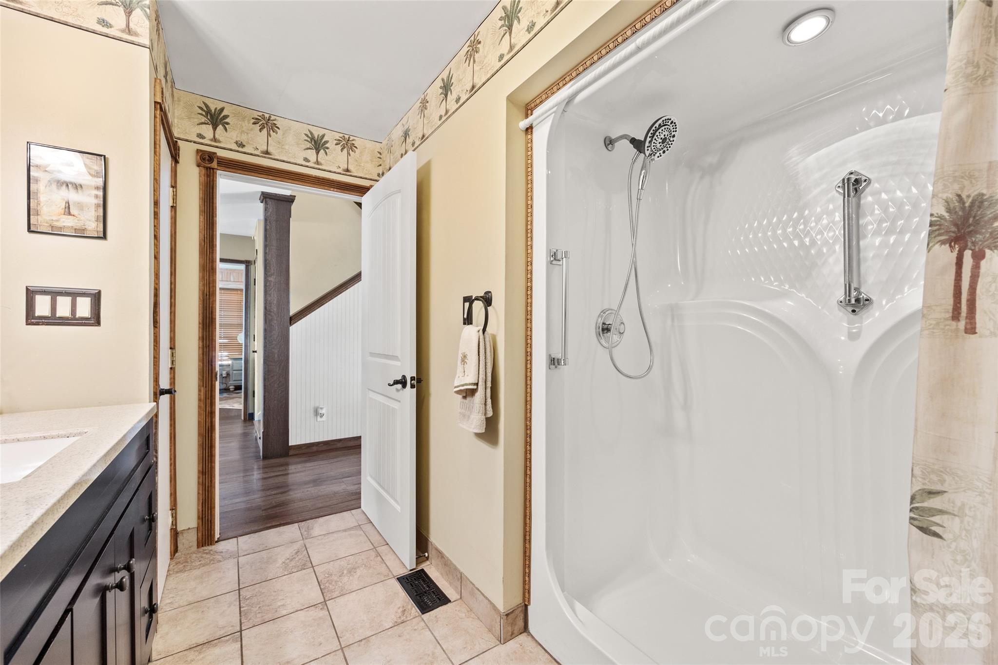 27056 Catamaran Drive Tega Cay, SC 29708 - Photo 34 of 48 a bathroom with a tub shower and a sink