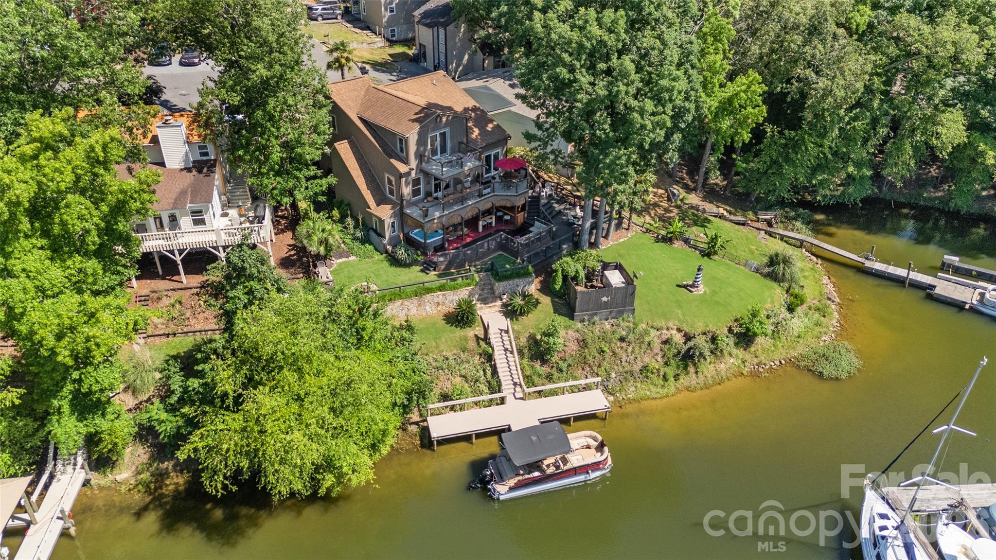 27056 Catamaran Drive Tega Cay, SC 29708 - Photo 35 of 48 an aerial view of a house with a lake view