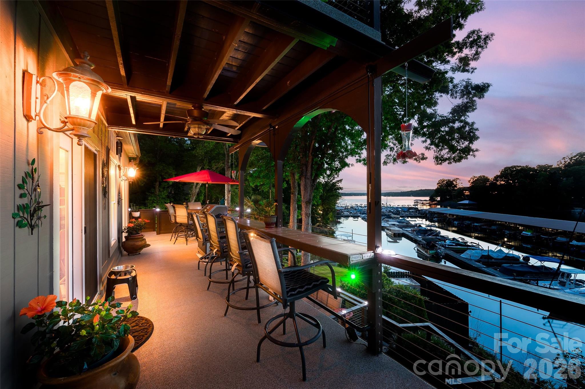 27056 Catamaran Drive Tega Cay, SC 29708 - Photo 41 of 48 a view of a chairs and tables in the patio
